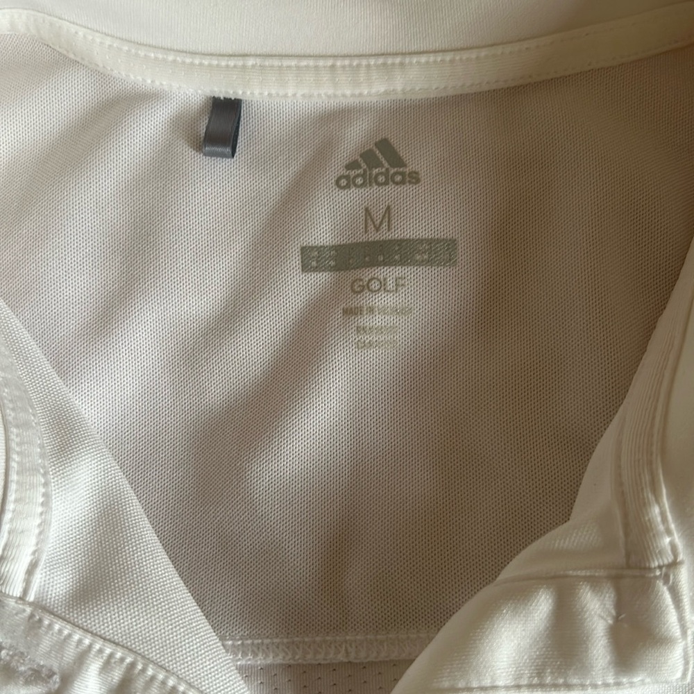 Women’s white polo sleeveless golf shirt